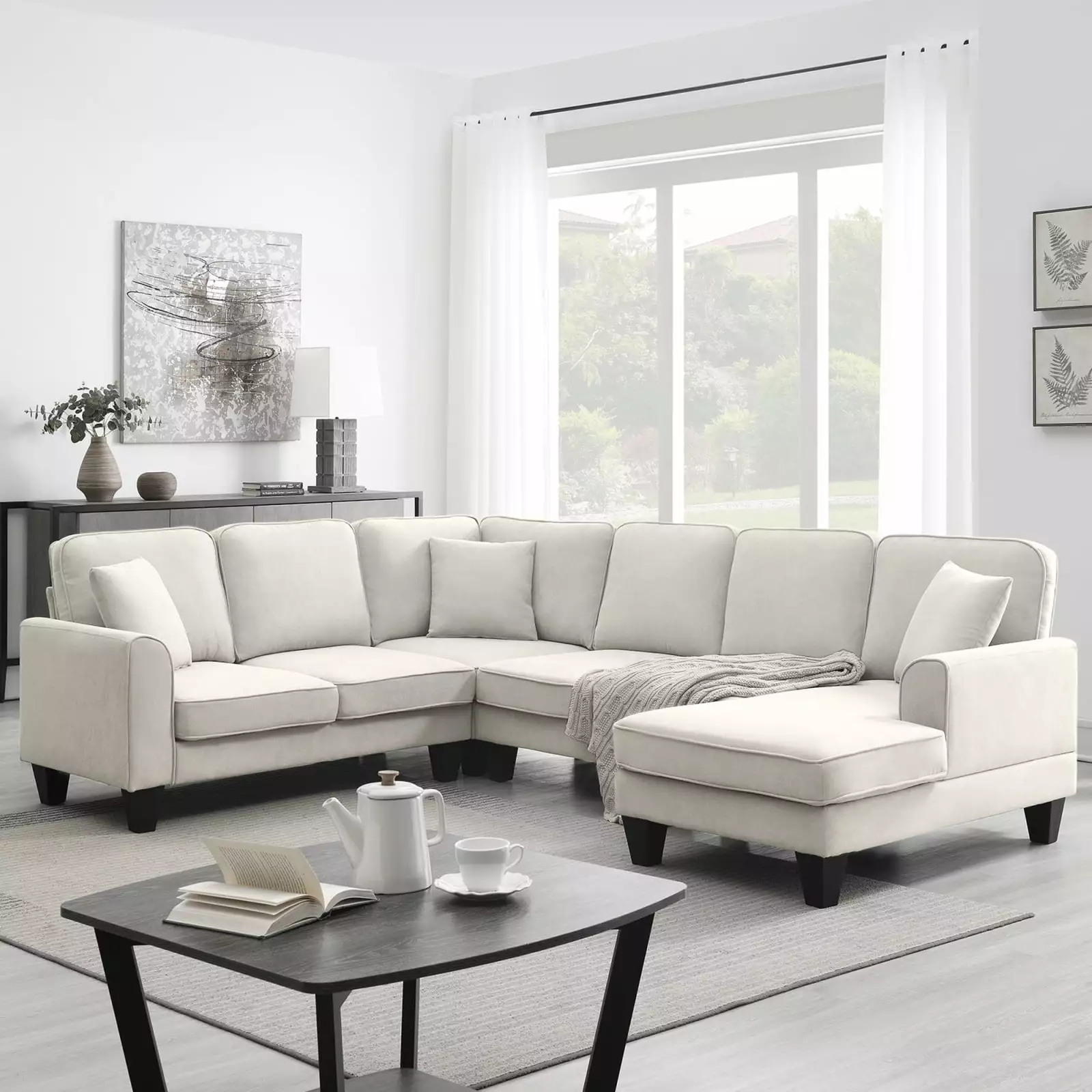 Beige U Shape 7-Seat Modern Sectional Sofa. 108x85.5. Includes 3 Pillows. Versatile Design for Living Rooms. Apartments & Offices. Durable Fabric Upholstery. Easy Assembly